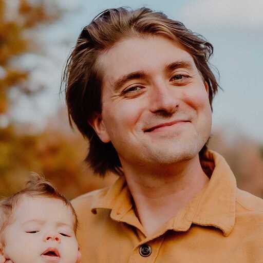 Headshot of Ken Blizzard-Caron